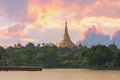 Shwedagon Pagoda seen from Kandawgyi Lake at sunset, Yangon, Myanmar Royalty Free Stock Photo