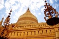 Shwezigon Pagoda Paya pagoda chedi temple for burmese people and foreign traveler travel visit respect praying in Nyaung U town at Royalty Free Stock Photo