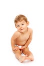 Shy cute baby boy in diapers Royalty Free Stock Photo