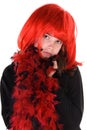 Shy girl in red wig. Royalty Free Stock Photo