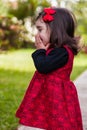 Shy, happy, smiling toddler baby girl giggling and laughing Royalty Free Stock Photo