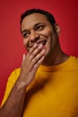 shy indian man in yellow t Royalty Free Stock Photo