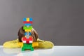 Shy little child hiding behind built toy for kid psychology Royalty Free Stock Photo