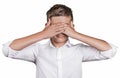 Shy man closing covering eyes with hands can't see Royalty Free Stock Photo