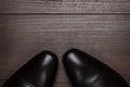 Shy man standing on the wooden floor Royalty Free Stock Photo