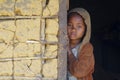 Shy and poor african girl with headkerchief