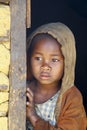 Shy and poor african girl with headkerchief