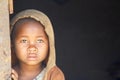 Shy and poor african girl with headkerchief