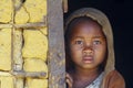 Shy and poor african girl with headkerchief