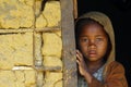 Shy and poor african girl with headkerchief