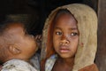 Shy and poor african girl with headkerchief