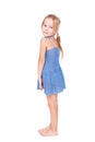 Shy pretty little girl in blue dress Royalty Free Stock Photo