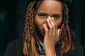 Shy young black female. Embarrassed girl Royalty Free Stock Photo