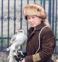 Shymkent, KAZAKHSTAN - 22 March 2017: People Celebrating the Kazakh holiday NARIYZ. Boy with a hawk