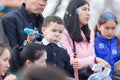 Shymkent, KAZAKHSTAN - 22 March 2017: People Celebrating the Kazakh holiday NARIYZ. Boy with soap bubbles