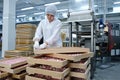 Shymkent, Kazakhstan - 03.12.2020 : Rakhat confectionery factory. Employees are engaged in packaging marmalade candies