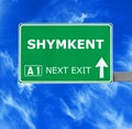 SHYMKENT road sign against clear blue sky Royalty Free Stock Photo
