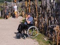 SIAULIAI, LITHUANIA - JUL 28, 2019: Pilgrims on the religious event on the Hill of Crosses