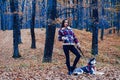 Siberian husky favorite pet. Animal husbandry. Girl pretty stylish woman walking with husky dog autumn forest Royalty Free Stock Photo