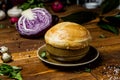 Siberian roast in pots, with potatoes and mushrooms, lid of dough