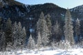 Siberian taiga at the foot of the Khamar-Daban range in the Baikal region in winter Royalty Free Stock Photo