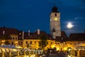 Twilight image of Council Tower with moon