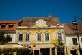 SIBIU, ROMANIA: The so-called home with eyes, rooflights on roof. Traditional multicolored houses on the street with unusual