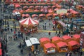 Christmas market Targul de Craciun in Sibiu is set to last until January 3, 2020. Pattern of stalls with decorative red roofs. Royalty Free Stock Photo