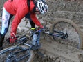 A cyclist fell bike in the mud