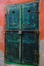 Sibiu, Romania, May 15, 2019: Traditional, colorful, decaying wooden courtyard doors of old townhouses in the center Royalty Free Stock Photo