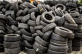 Used tire stacks in Workshop vulcanization yard