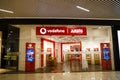 Sibiu, Romania - May, 2 2022: Vodafone and Arsis logo signboard at store front in Promenada Mall, one of the biggest