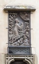 Bas-relief closed by a protective mesh on the facade of Lutheran Cathedral of Saint Mary. Sibiu city in Romania