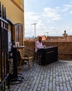 Sibiu, Romania - 2019. Young man playing piano at a local coffee shop in Sibiu Royalty Free Stock Photo