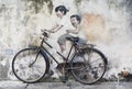 Sibling Cyclist Street Art Mural in Georgetown, Penang, Malaysia