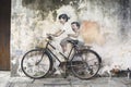 Sibling Cyclist Street Art Mural in Georgetown, Penang, Malaysia