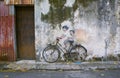 Sibling Cyclist Street Art Mural in Georgetown, Penang, Malaysia