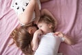 Sibling relationships, children's secrets, hug, close up, domest Royalty Free Stock Photo