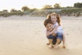 Siblings brother sister beach Royalty Free Stock Photo