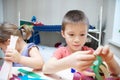 Siblings crafting - brother and sister playing together Royalty Free Stock Photo