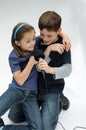 Siblings singing karaoke and fool arround Royalty Free Stock Photo