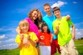 Siblings hold flowers. Royalty Free Stock Photo