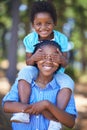 Siblings, portrait or happy kids hiking in forest to play or bond on holiday vacation in nature. Brother, black family Royalty Free Stock Photo