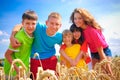 Siblings in wheat field Royalty Free Stock Photo