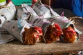 Chicken wrapped with old newspaper on market display at Sibu Central Market. Sibu Sarawak Malaysia Royalty Free Stock Photo