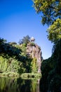 Sibyl temple and lake in Buttes-Chaumont Park, Paris Royalty Free Stock Photo