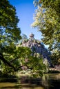 Sibyl temple and lake in Buttes-Chaumont Park, Paris Royalty Free Stock Photo