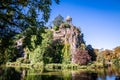 Sibyl temple and lake in Buttes-Chaumont Park, Paris Royalty Free Stock Photo