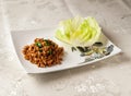 Sichuan Style Black Pork Meat Lettuce Wrap served dish isolated on background top view of hong kong chinese food