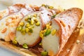 Sicilian cannoli on a tray, delicious Italian food made of ricotta and pistachio grains Royalty Free Stock Photo
